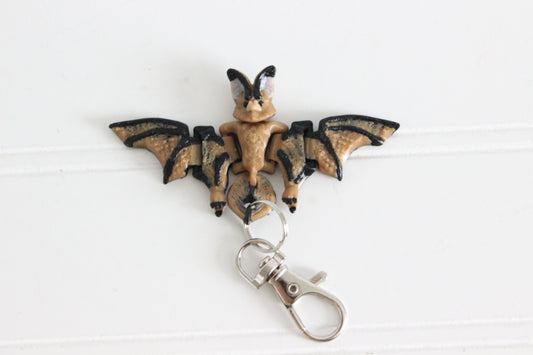 3D-printed bat keychain with spread wings and a silver key ring.